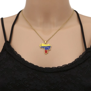 Detail of Venezuela map pendant with tricolor flag colors on a gold chain necklace