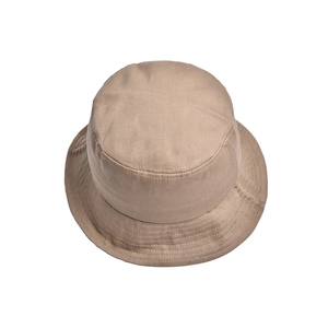 Close-up of khaki cotton bucket hat with detailed parallel reinforced stitching on brim