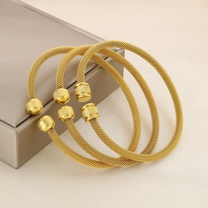 Three-piece gold-toned stainless steel open bangles with woven texture and ribbed ends