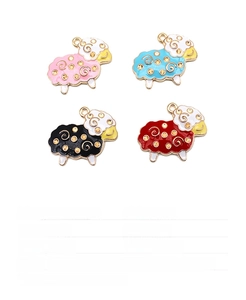 Macro detail of four colorful sheep charms for DIY jewelry making in pink blue black red
