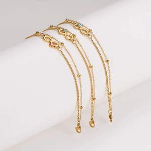 Bohemian gold layered bracelets with infinity symbol and colorful evil eye charms