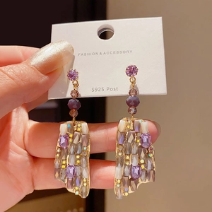 Luxurious S925 silver needle drop earrings with purple square crystals and gold plating