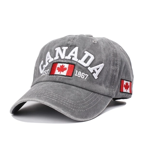 Detailed white CANADA 3D embroidery on gray washed cotton baseball cap with flag