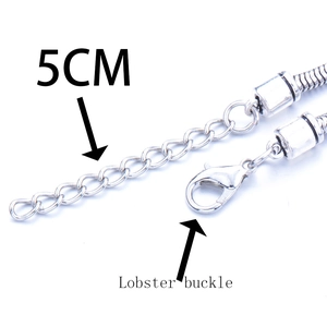Detail of silver beaded bracelet featuring a 5cm extension chain and secure lobster buckle