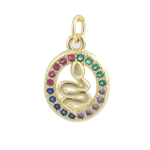 Macro shot of gold snake charm with colorful zircon stones for jewelry making