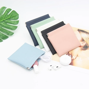 Detailed close-up of six colorful PU leather squeeze pouches for sunglasses and cosmetics