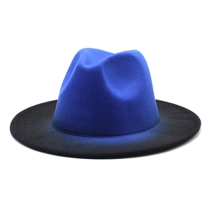 Close-up detail of blue crown and black brim on thick wool felt fedora hat for unisex