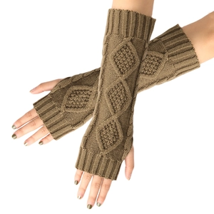 Detailed close-up of dark brown cable knit long fingerless gloves with diamond patterns