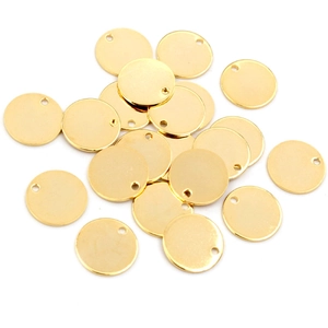 Detailed view of polished gold stainless steel round tags for DIY jewelry making