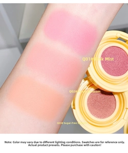 Swatches of three cushion blush shades including peach and coral on skin with yellow compacts