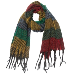 Close-up of multicolored plaid scarf with thick knit texture and black fringe tassels