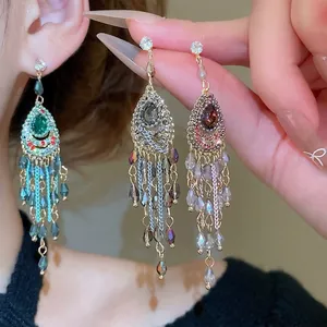 Elegant bohemian drop earrings with shiny crystals and long tassel fringe in three colors