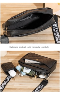 Detail of black quilted crossbody bag showing spacious interior storage and metal zipper