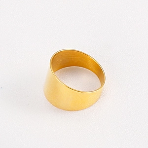 Detailed 45-degree angle view of a wide polished gold minimalist stainless steel ring