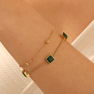 Double-layered 18K gold plated stainless steel bracelet with green square gems and beads