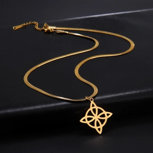 Detail of gold-plated stainless steel witch knot pendant with a flexible snake chain