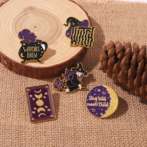 Vintage punk witch enamel pin set with wizard hat and magic potion motifs on burlap