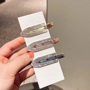 Three-piece rhinestone metal hair clip set in gold, rose gold and silver finishes