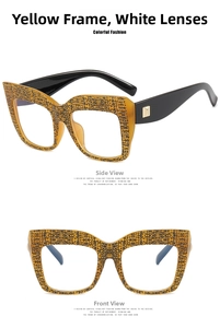 Detail of yellow leopard print square frames with gold metal hinges and clear lenses