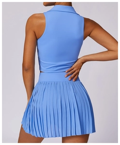 Back view of light blue sleeveless polo top and pleated tennis skirt set for women