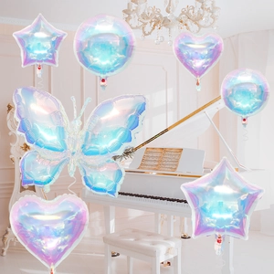 Iridescent butterfly and star foil balloon set in a luxurious indoor party setting