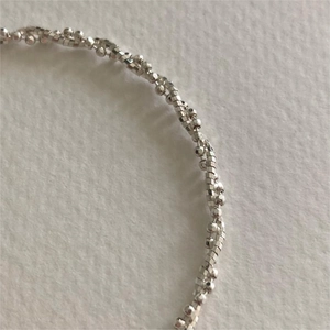 Minimalist 925 sterling silver faceted bead bracelet with geometric spiral weave design