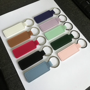 Rectangle PU leather keychains in eleven colors with metal rings and fine stitching