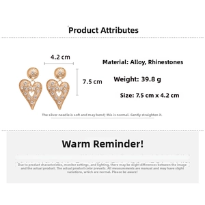 Detailed size specifications for heart drop earrings with rhinestone details