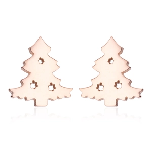 Macro detail of rose gold Christmas tree stud earrings with star-shaped cutout design