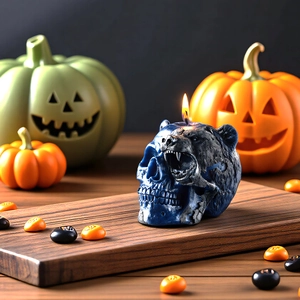 Gothic skull and bear aromatherapy candle with flickering flame on festive pumpkin background