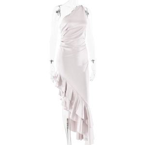 Detail view of light pink one-shoulder satin dress with asymmetrical ruffled hemline