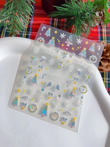Macro shot of laser holographic Christmas nail stickers featuring snowflakes and stars