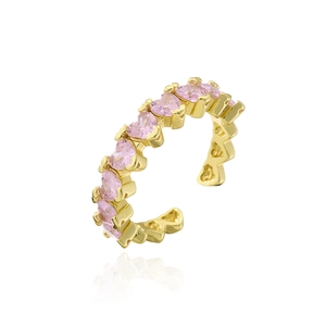 Detailed macro view of gold plated adjustable ring with pink heart-shaped zircon stones