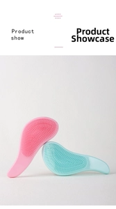 Detail of pink and blue ergonomic detangling hairbrushes with soft bristles for scalp massage