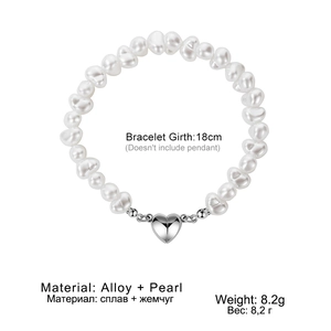 White pearl bracelet with heart shaped magnetic alloy clasp and 18cm circumference