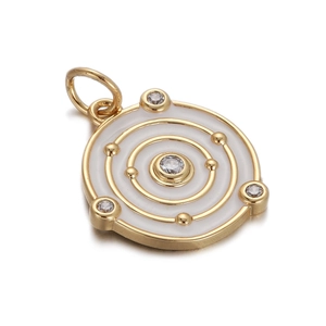 Detail of golden orbital sun pendant with white enamel inlay and sparkling crystals