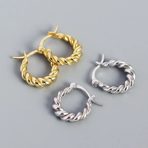 Minimalist vintage geometric twisted metal hoop earrings in polished gold and silver finish