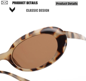 Macro view of vintage oval sunglasses with tortoiseshell frames and brown lenses