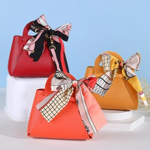 Chic mini PU leather wedding gift bags in red, orange, and yellow with silk scarves