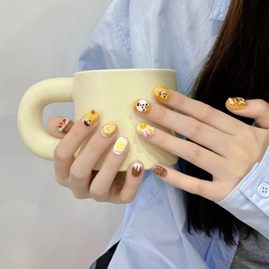 Handmade 3D cartoon press-on nails featuring cute bears and dessert art patterns