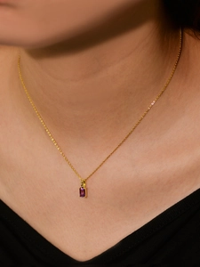 Detail of s925 sterling silver necklace with rectangle cut purple amethyst pendant