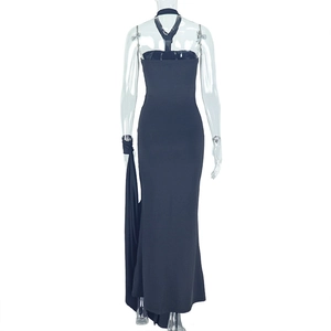 Detail view of the back design on this black backless evening dress with halter neckline