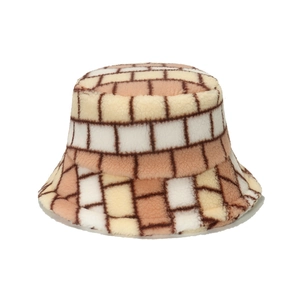 Fuzzy checkered bucket hat for women featuring warm brown and cream plush patchwork pattern