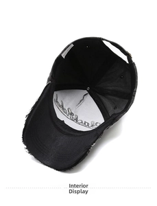 Detail view of the black washed baseball cap interior showing stitching and embroidery