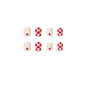 Creamy white and red heart press-on nails with checkered pattern and glossy finish