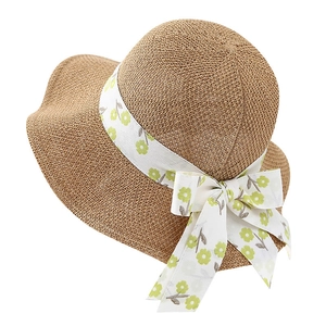 Breathable straw sun hat with wide brim and floral ribbon bow for summer UV protection