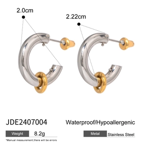 Detailed view of two-tone stainless steel C-shape earrings with size measurements