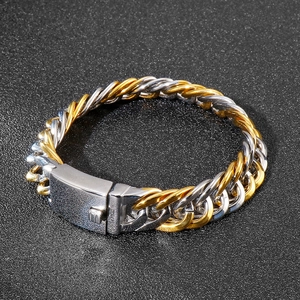 Two-tone silver and gold Cuban link bracelet for men with heavy metal clasp closure