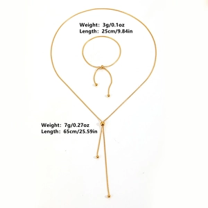 Close-up of 18k gold snake chain necklace and bracelet set with size and weight specs