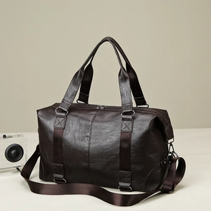 Large dark brown PU leather travel bag with adjustable strap for sports and training